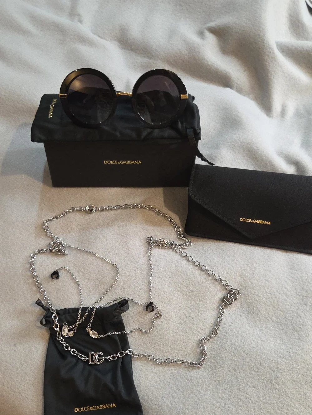 Dolce & Gabbana DG4393 Black Round Sunglasses with Silver Chain